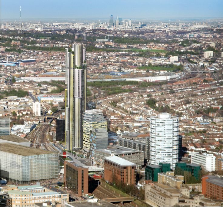 Morello Tower in East Croydon with Canary Wharf in background